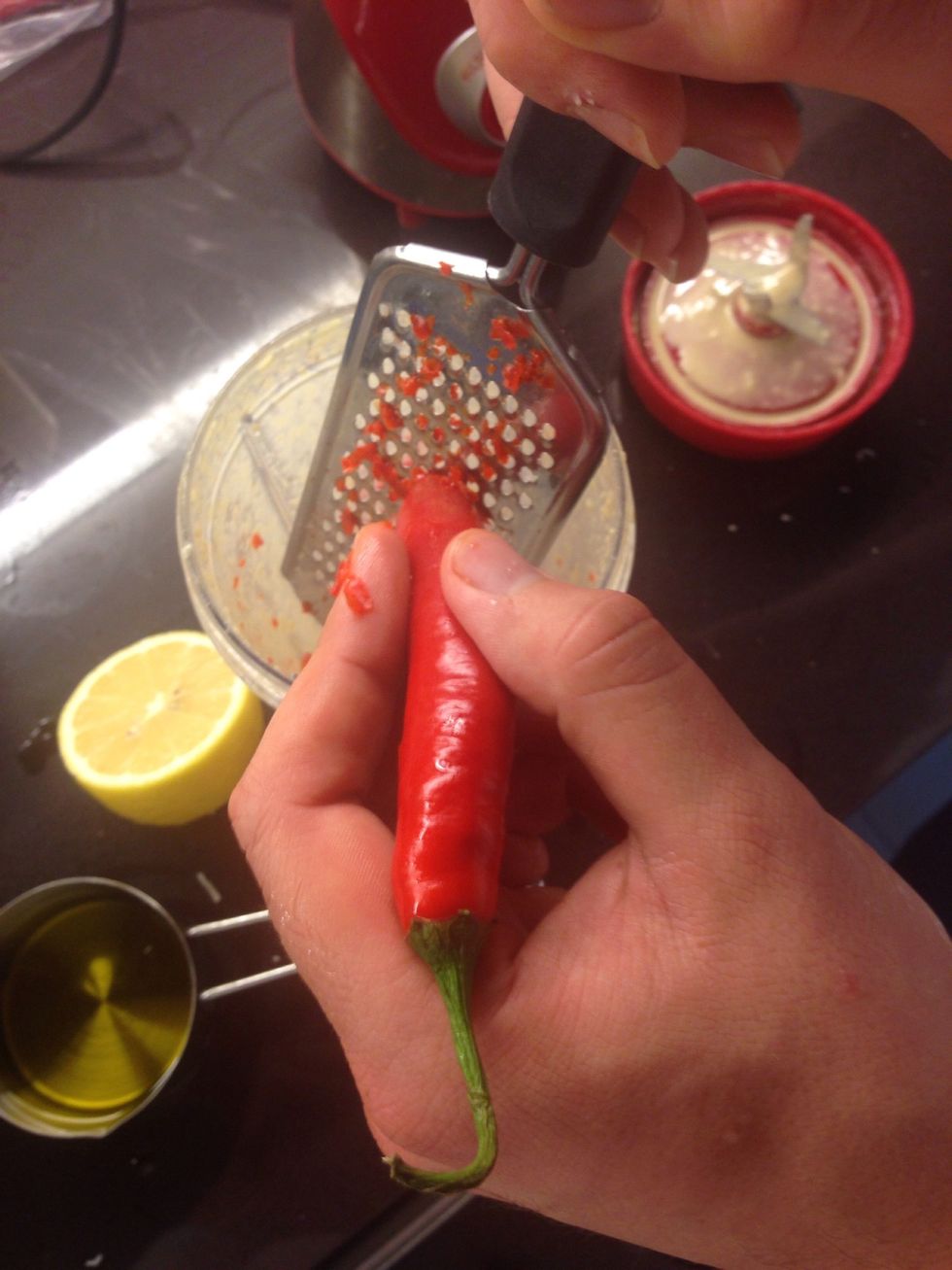 Put all mixed ingredients into a blender and we like our Caesar a little spicy so we minced 1/2 a hot pepper in