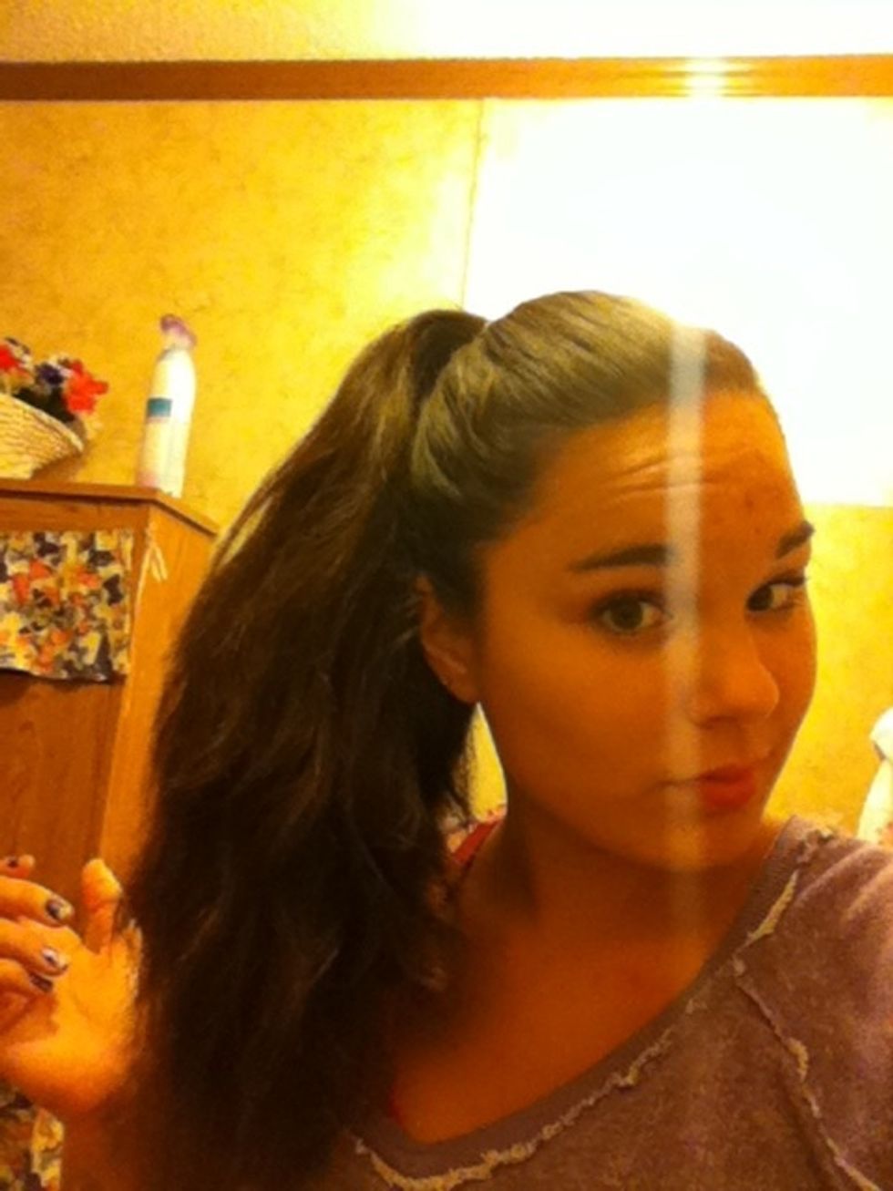 Put all of your hair up into a pony tail.