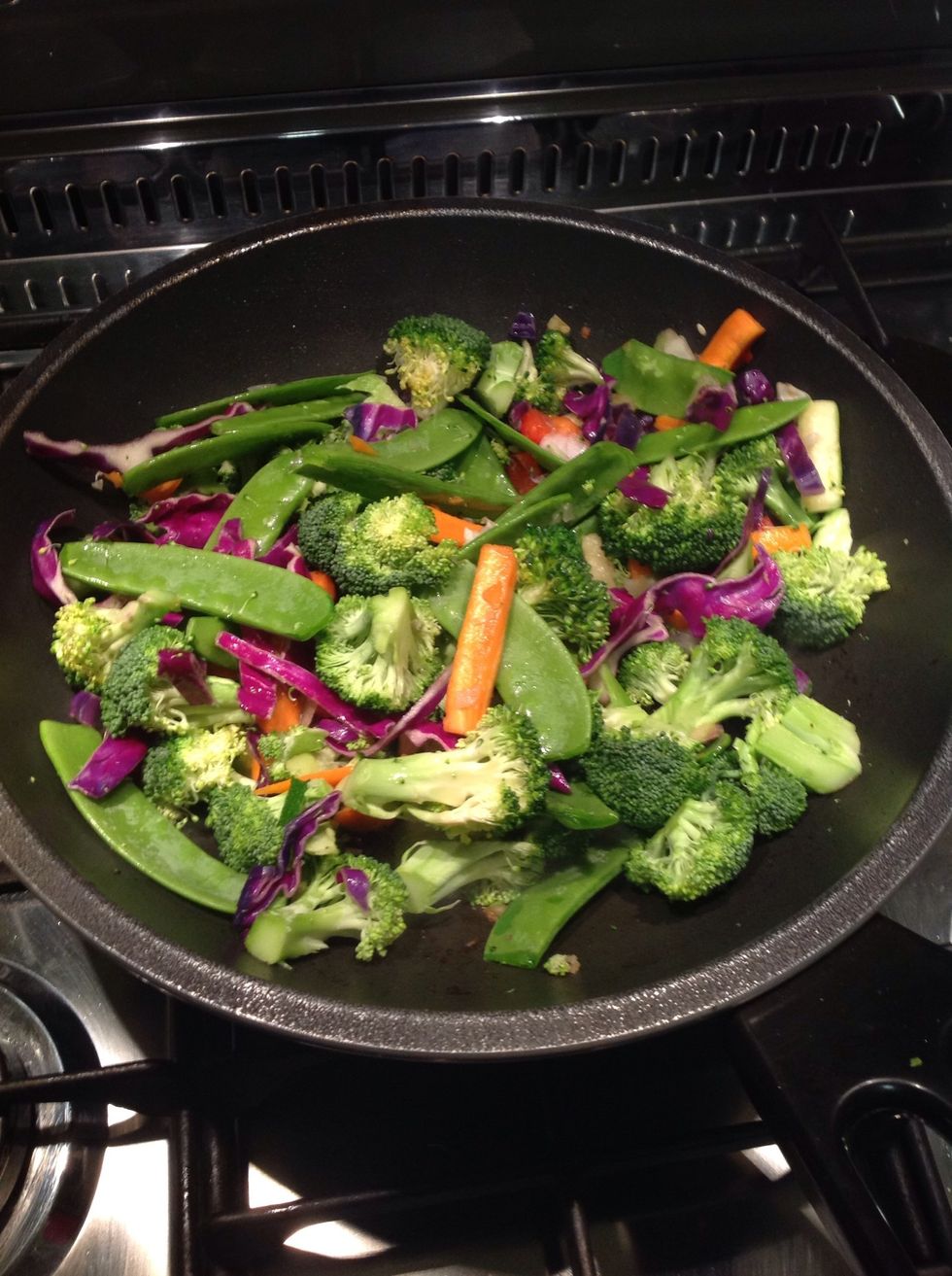 Put all of your vegetables into the wok