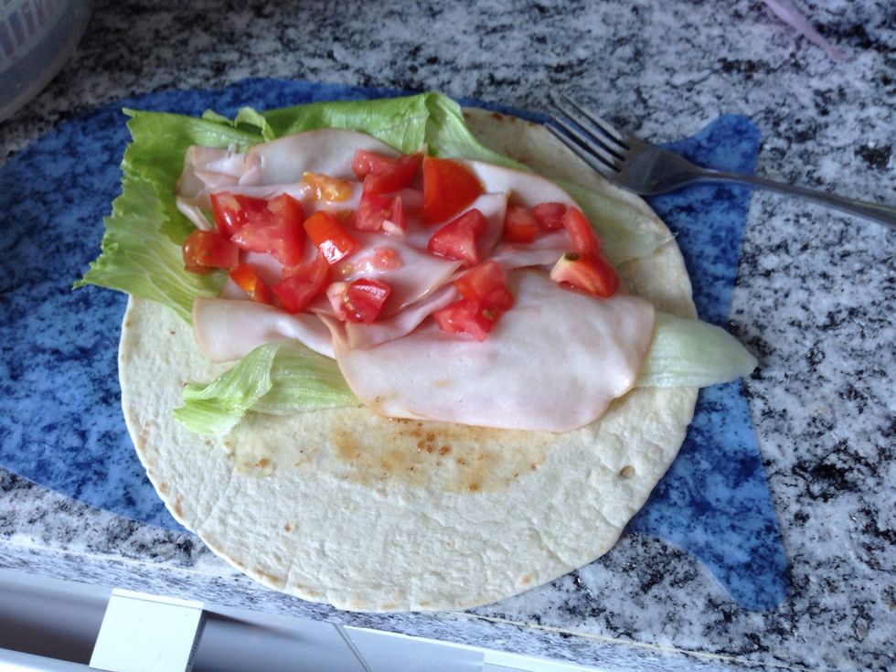 Put all the ingredients on to the tortillas.