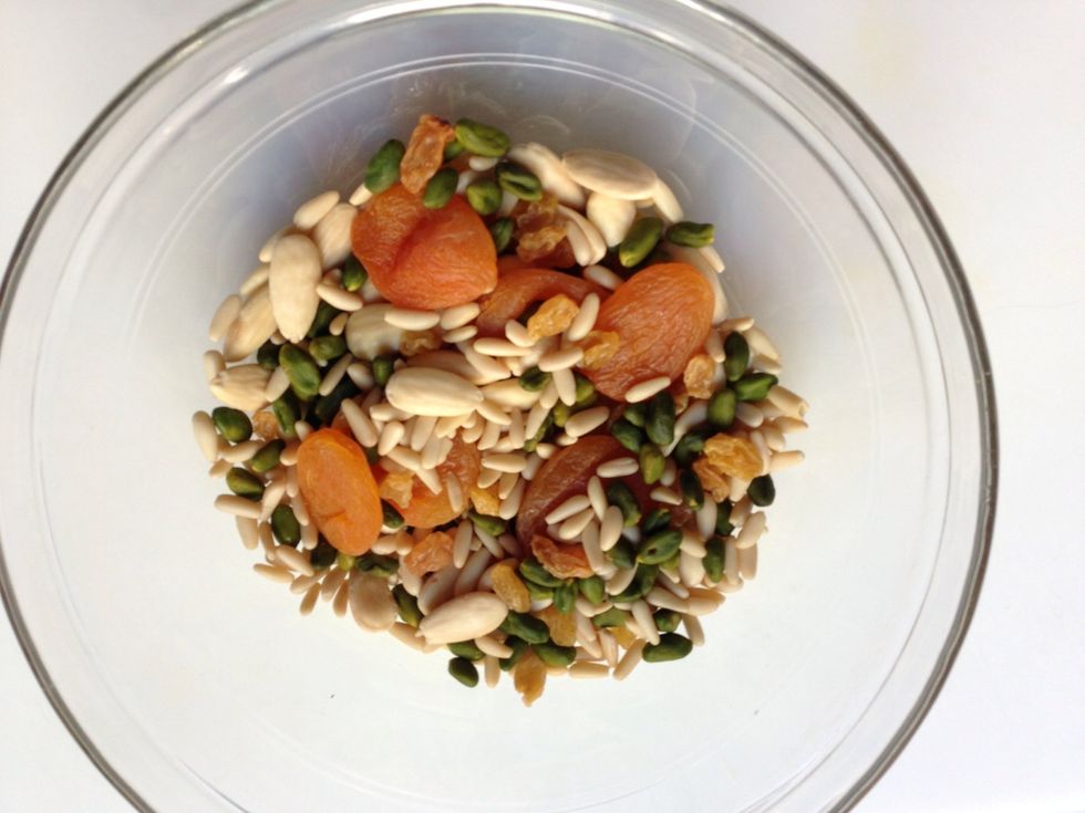 Put all the nuts and dried fruits in a bowl and soak them in boiling water for around 30 mins