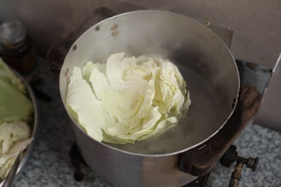 Put all your cabbage in the hot water. Just for a few minutes to soften it. We don't want to cook the cabbage.
