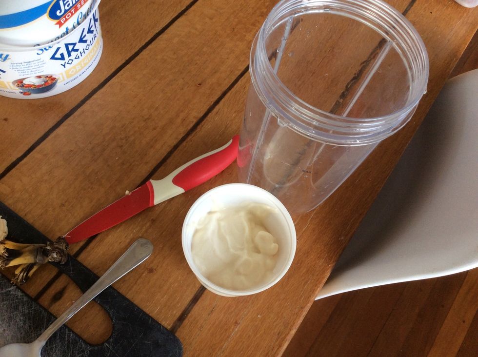 Put almost a cup of yoghurt in the blender 1st