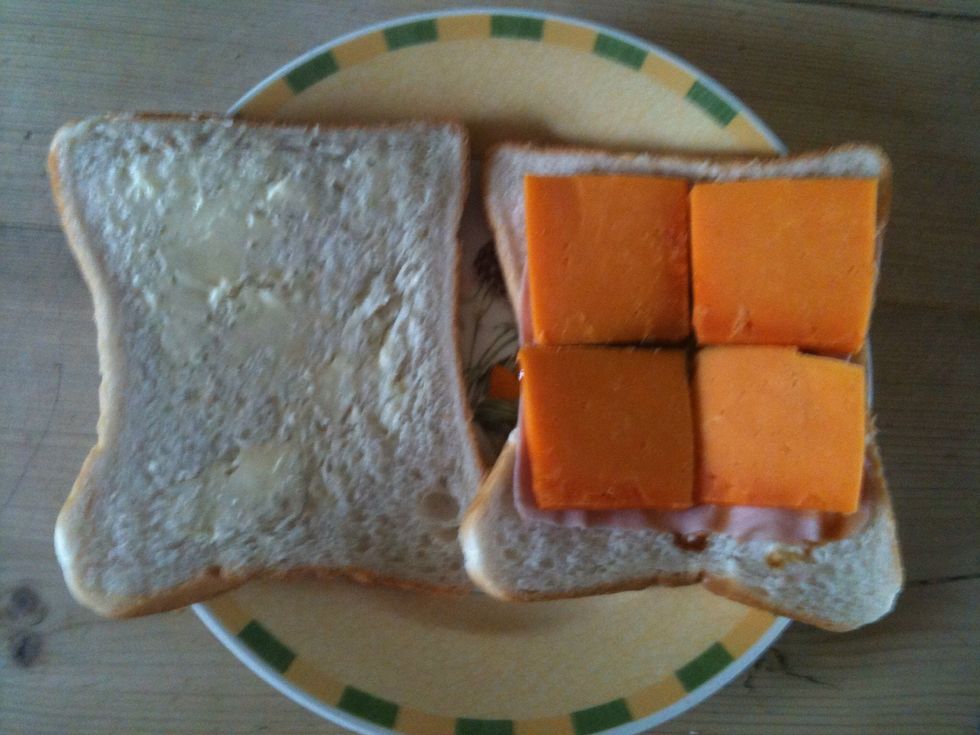 Put an even amount of cheese on the marmite