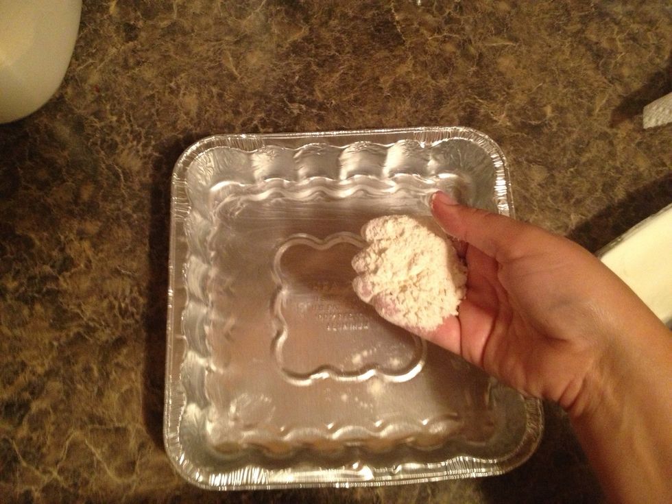 Put and little bit of flour and shake it around the pan until it too is evenly coated. This will keep your cake from sticking to the pan.