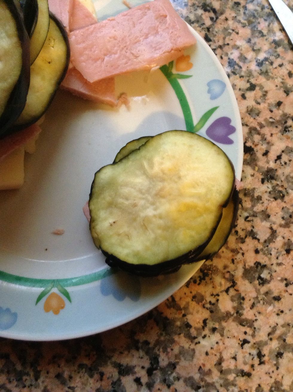 Put another eggplant slice on the other to create a sort of sandwich.