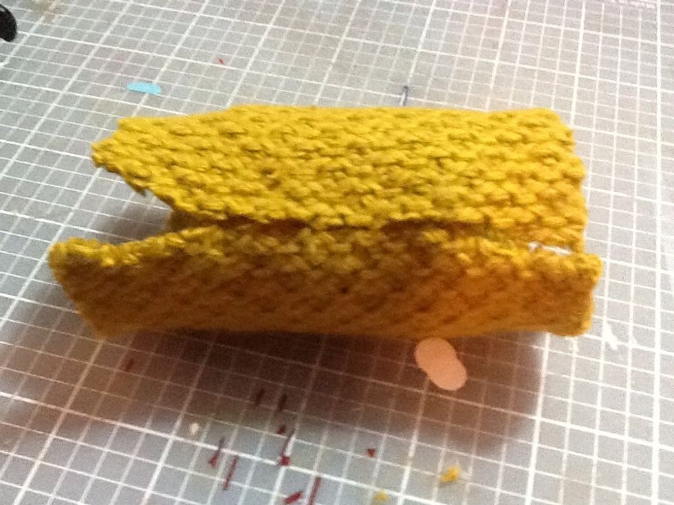 Put another line of glue where the fabric meets and press the glue into the fabric so each ends of the fabric touch.