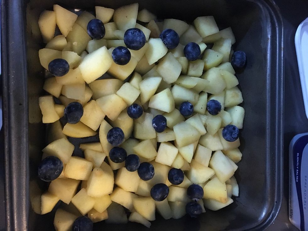 Put apple and berries in your pan. Make sure to drain the water from the apples.