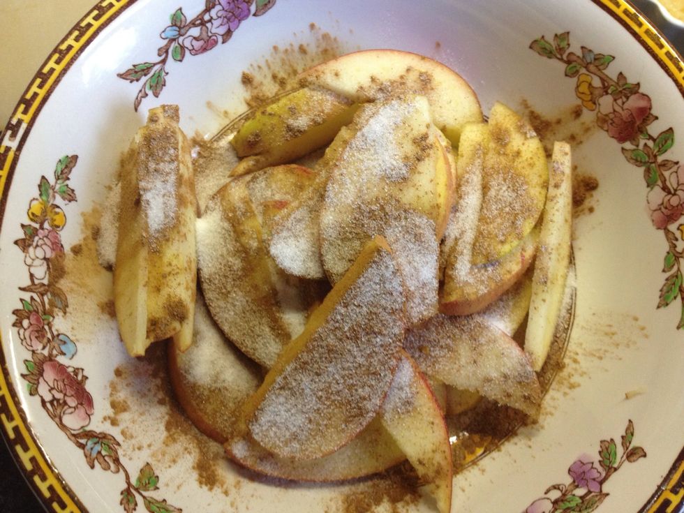 Put apples in a large bowl and cover with cinnamon and sugar