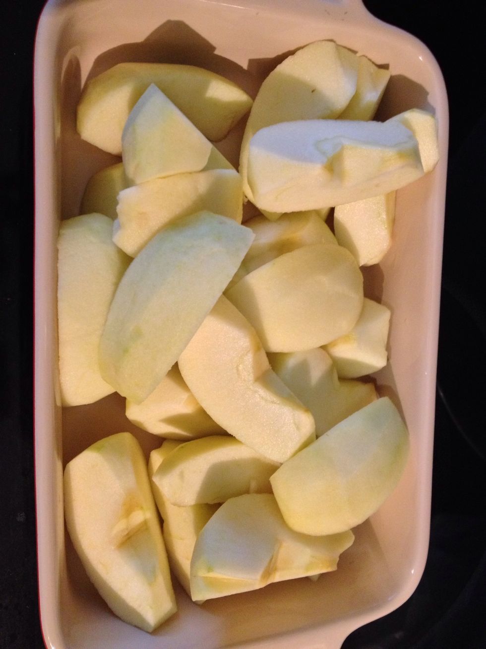 Put apples into your baking pan with no grease or butter