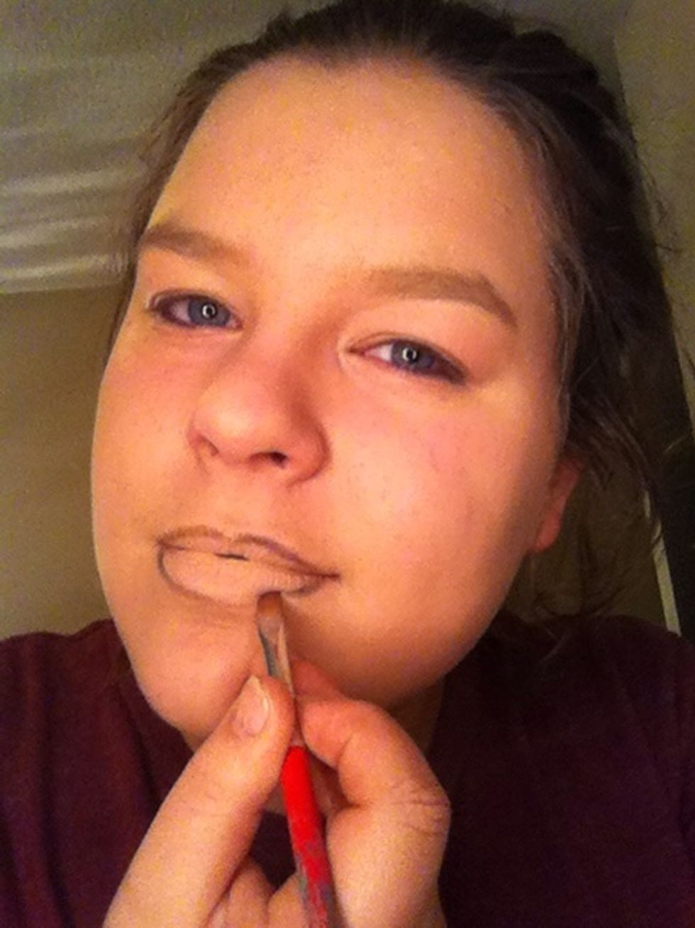 Put around lips as if it were lip liner