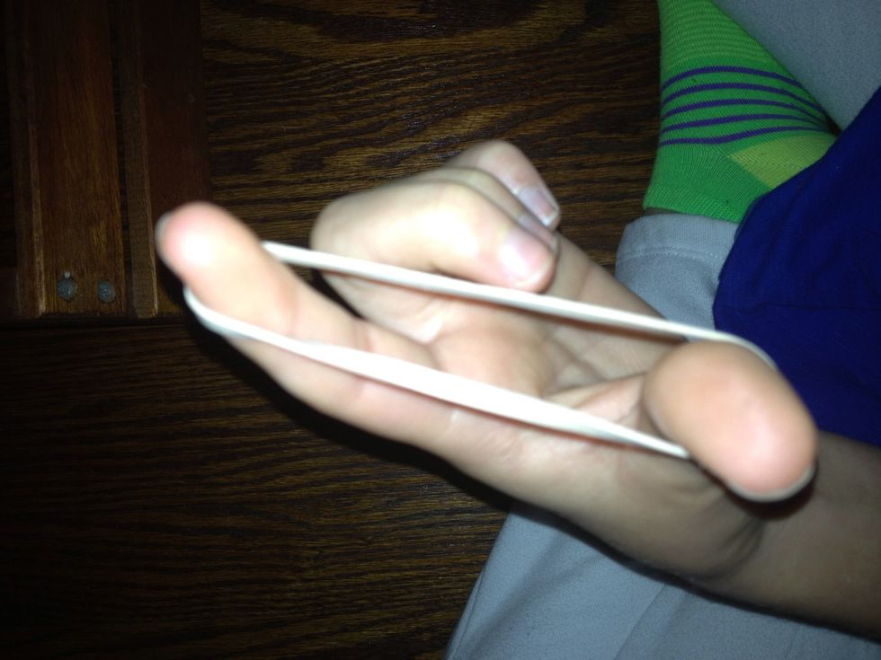Put around thumb and index fingers