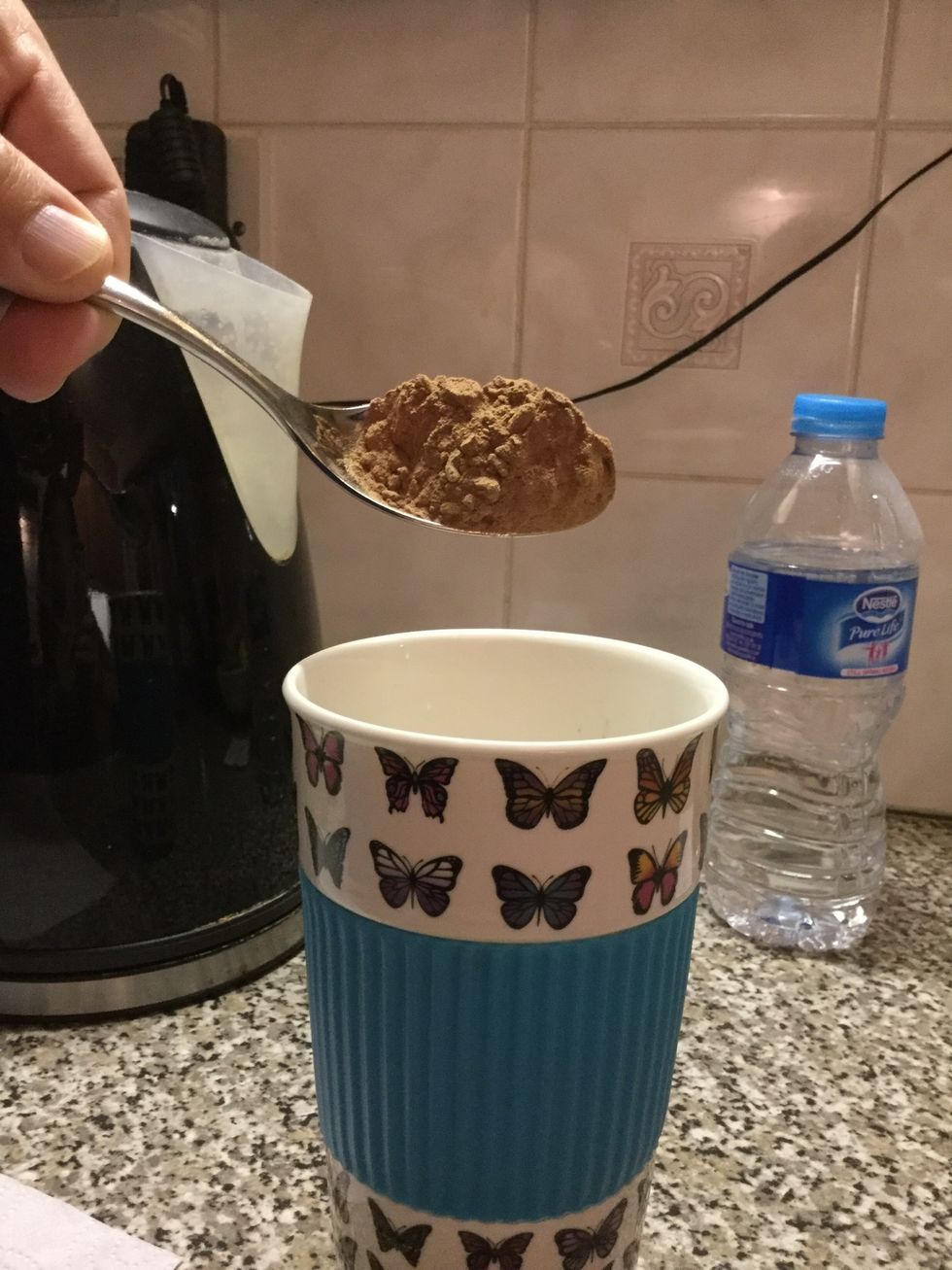 Put as much hot chocolate powder as you like into your cup.I did one big table spoon