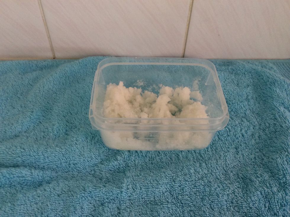 Put as much sugar into a bowl or container to make desired quantity. Add small amounts of oil and stir until mixture is combined and clumped together.