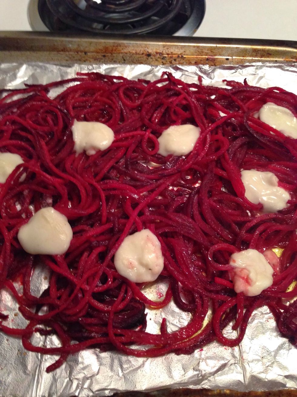 Put back in the oven & cook for another 5-7 minutes until they mozzarella has melted & the noodles are darker in color & have softened.