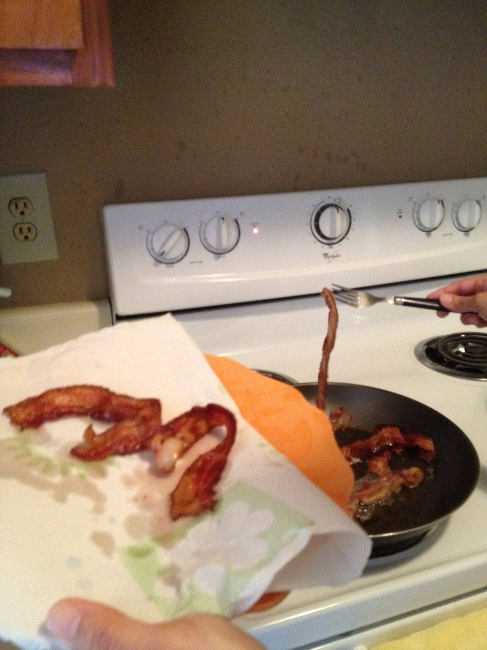 Put bacon on a plate & dry the grease with a paper towel