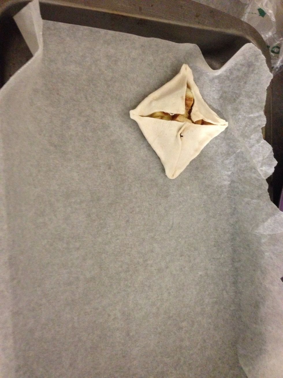 Put baking paper on. Place puffs.