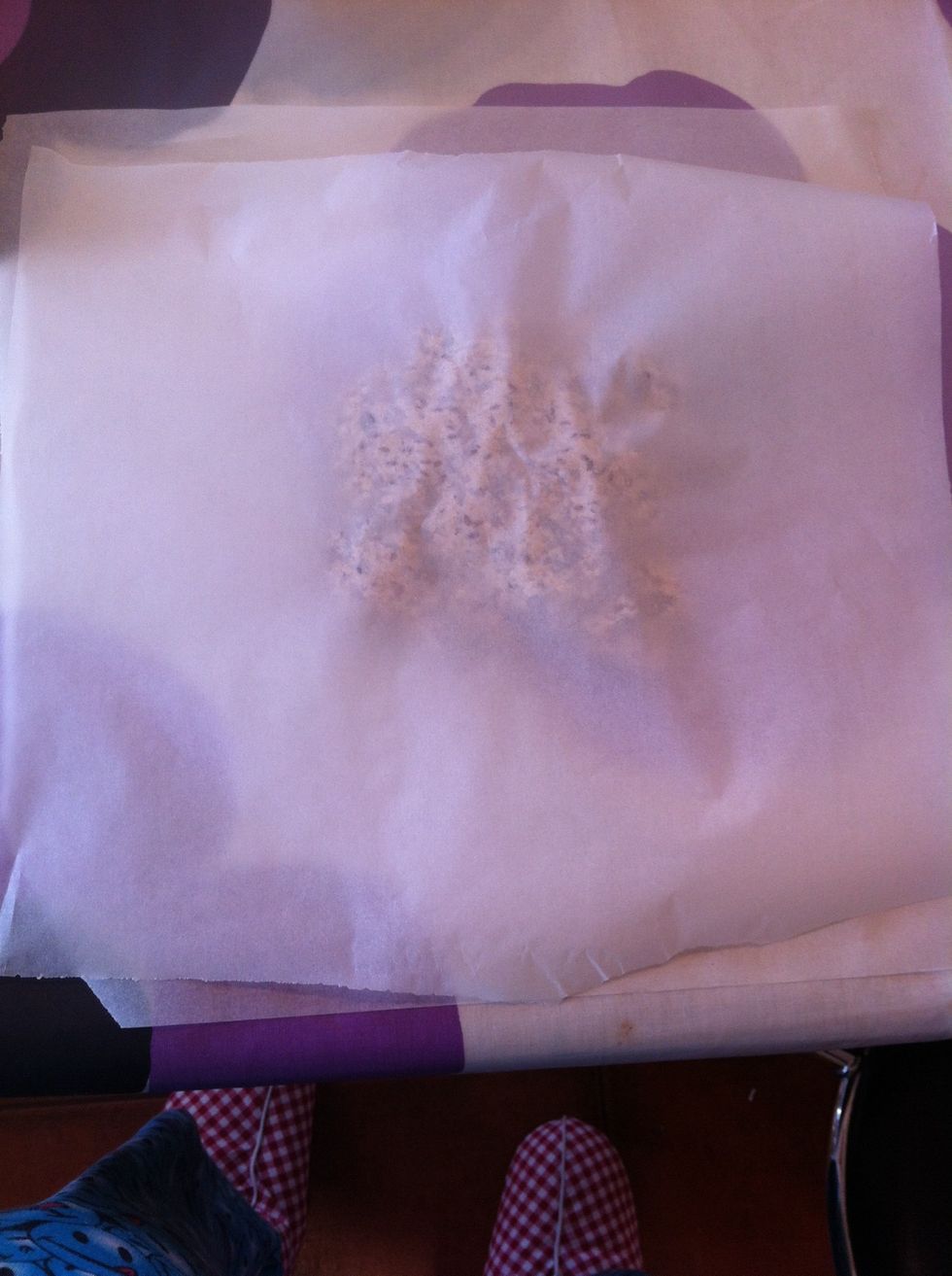 Put baking paper on top of the dough