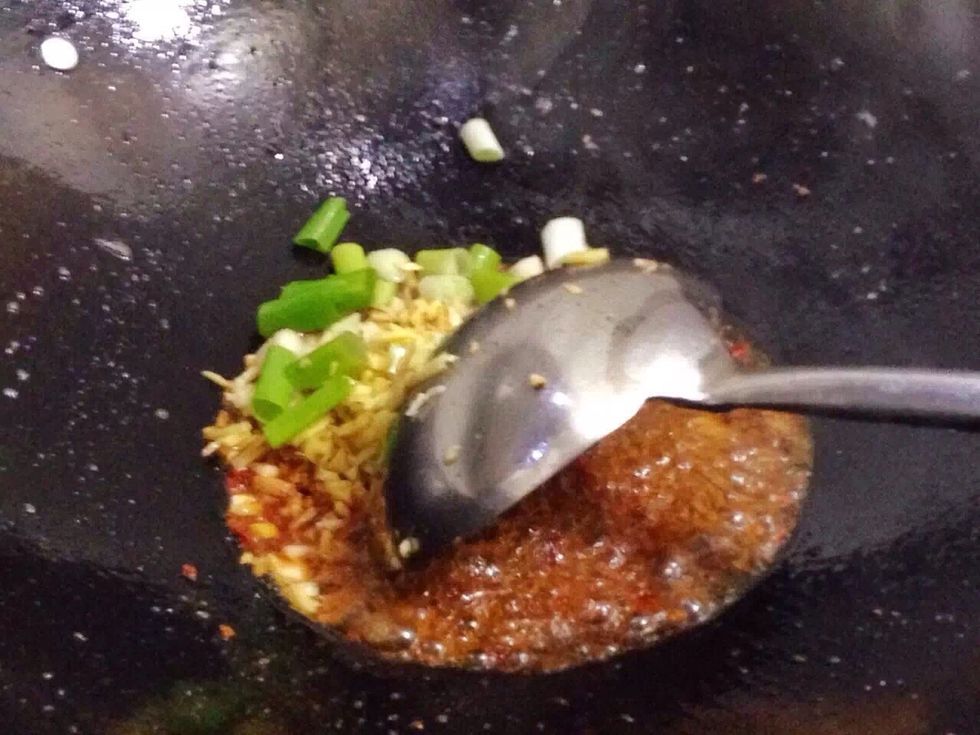 Put bean paste or Lao gan ma into 100\u00b0C rapeseed oil , then add grounded ginger and garlic , add a bowl of water to boil 5 minutes