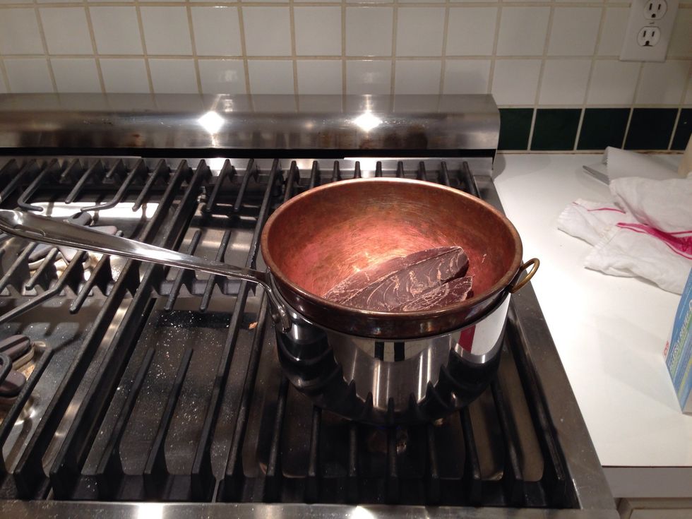 Put big chunks in that copper pot your dad was so happy to go get at Williams-Sonoma. Put it over a pan of water and turn on stove to low. Sort of quasi forget it for a while.