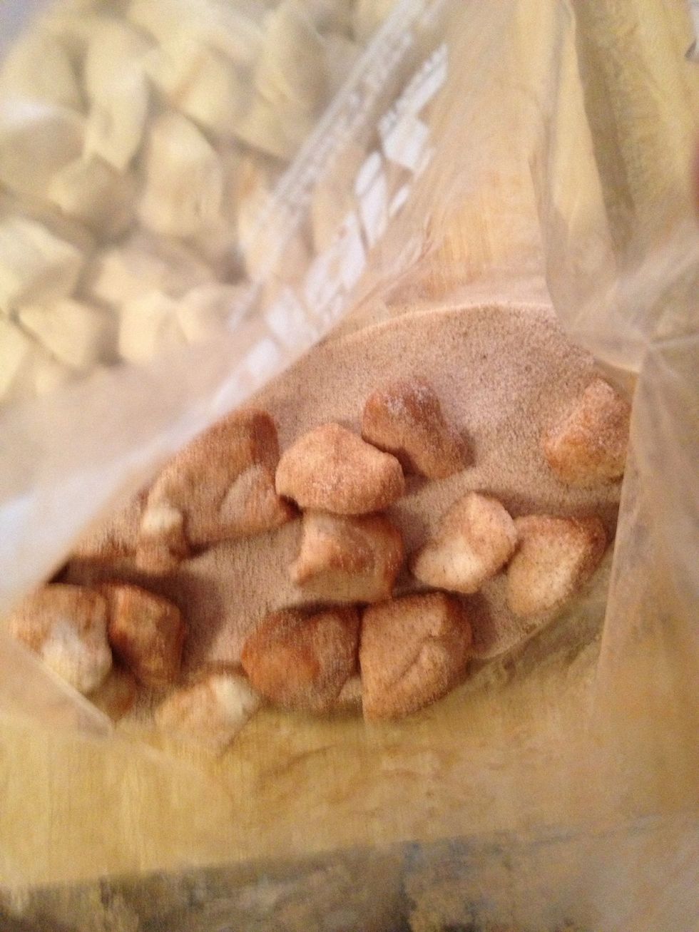 Put biscuits in bag and coat evenly