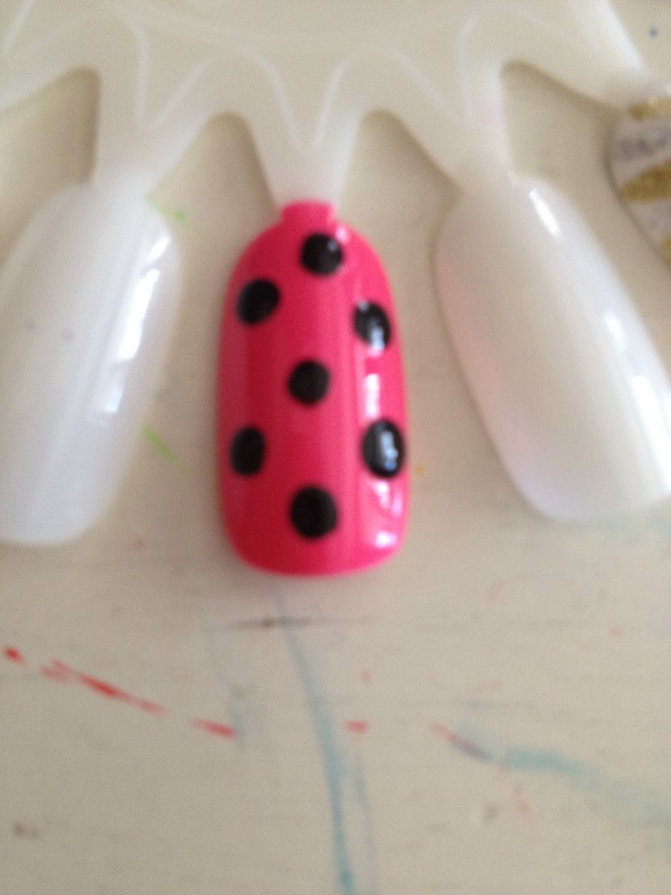 put black dotss! you can even leave it like this If you like!(: