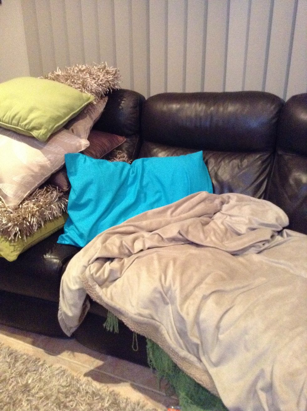 Put both blankets and put them lying down on the couch.
