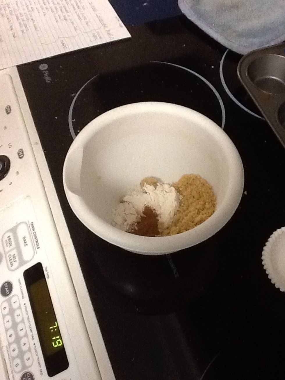 Put brown sugar flour and cinnamon in a small bowl and stir