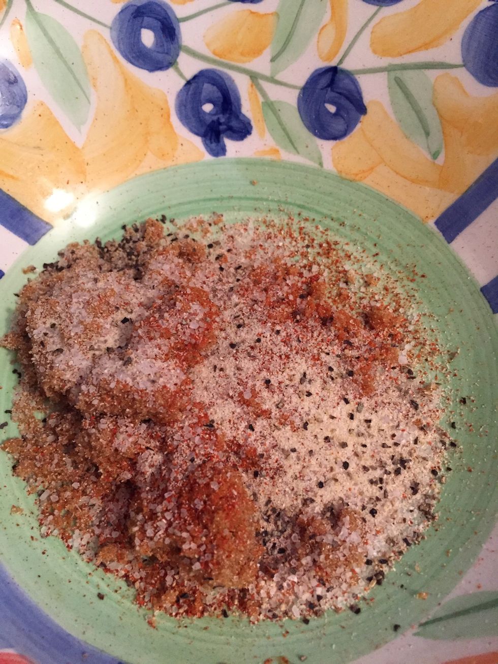 Put brown sugar, salt, pepper, cayenne pepper all in a bowl and mix together