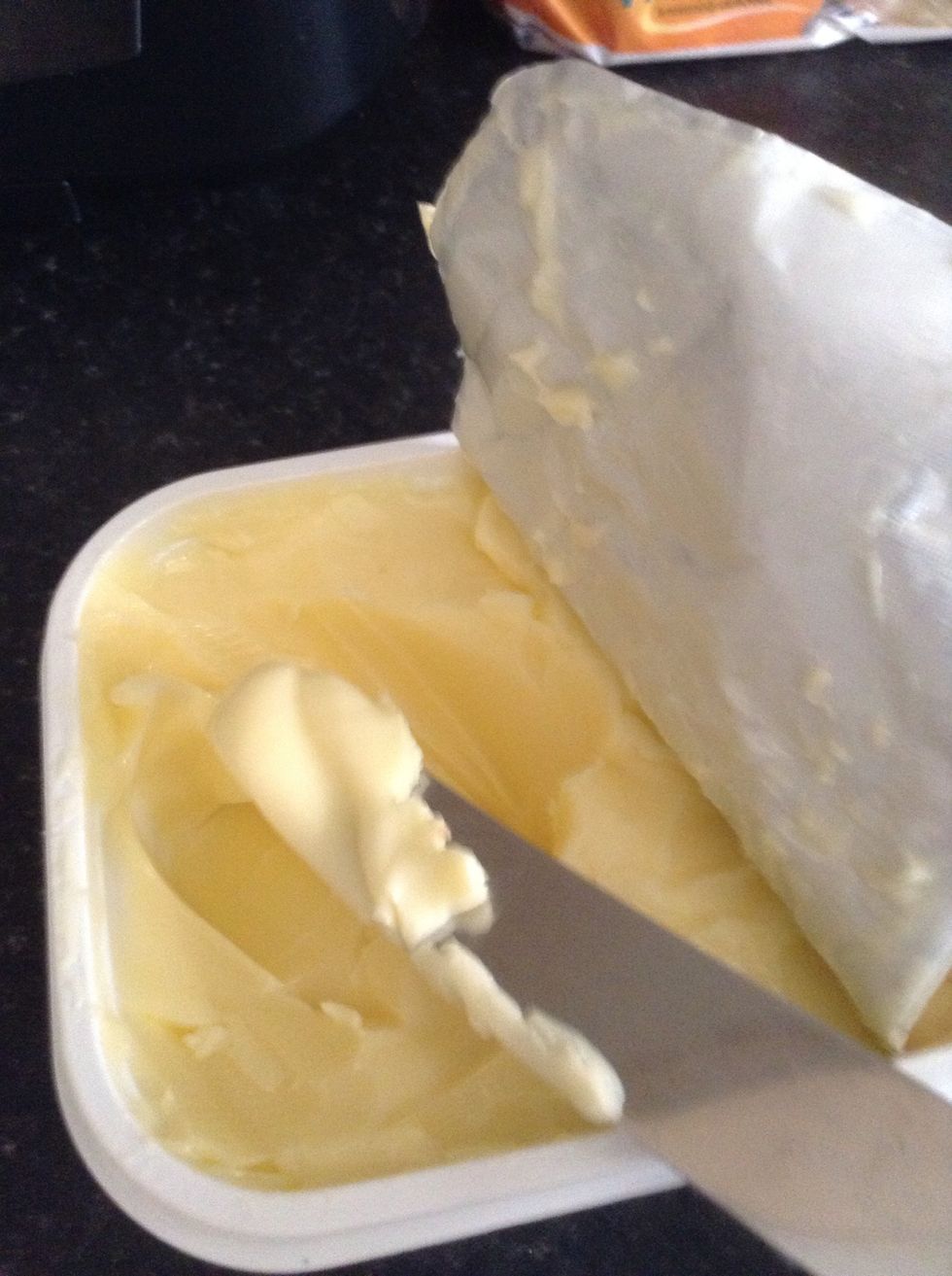 Put butter on knife then spread on bread