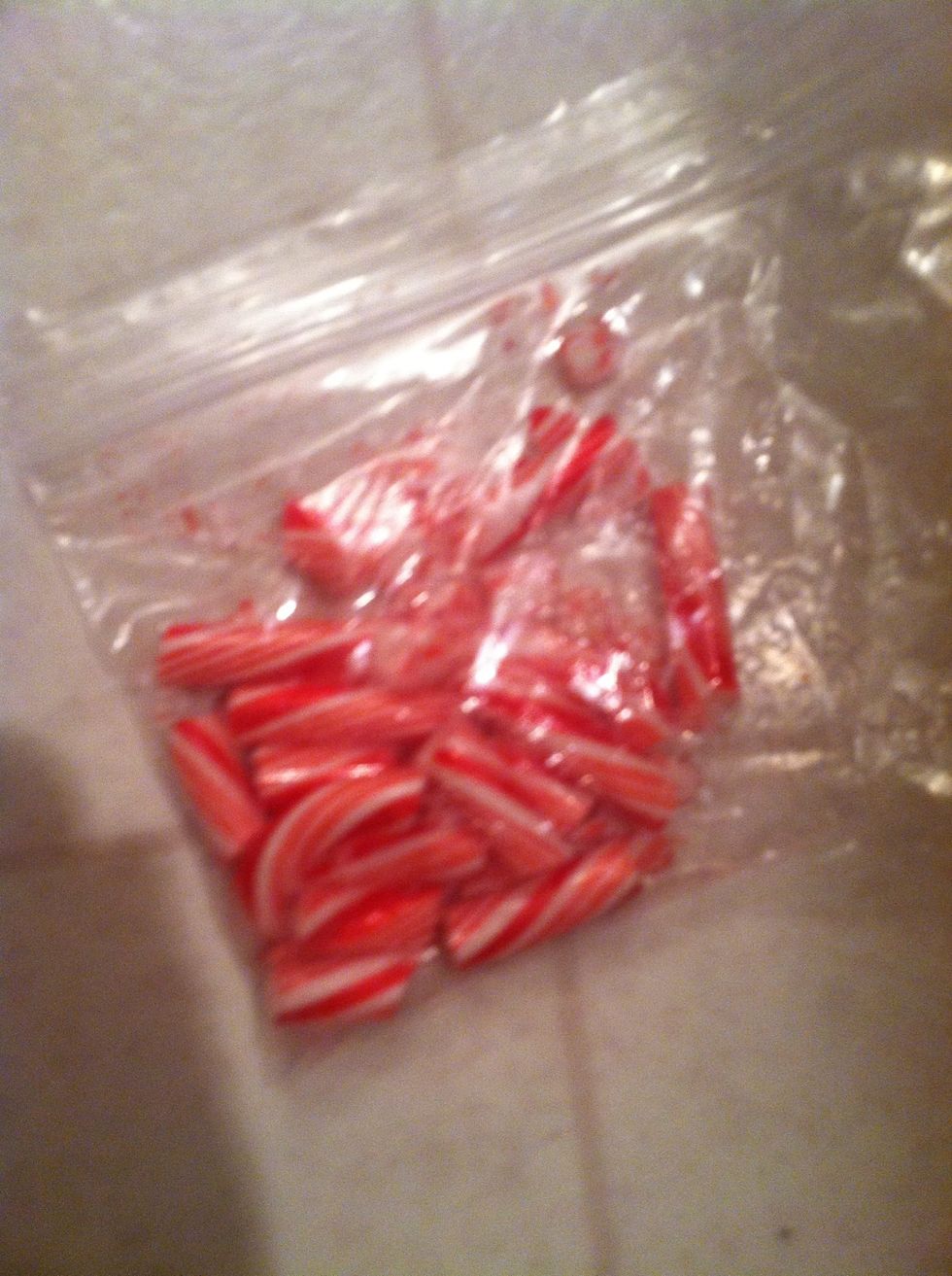Put candy canes in double plastic bag and smash.