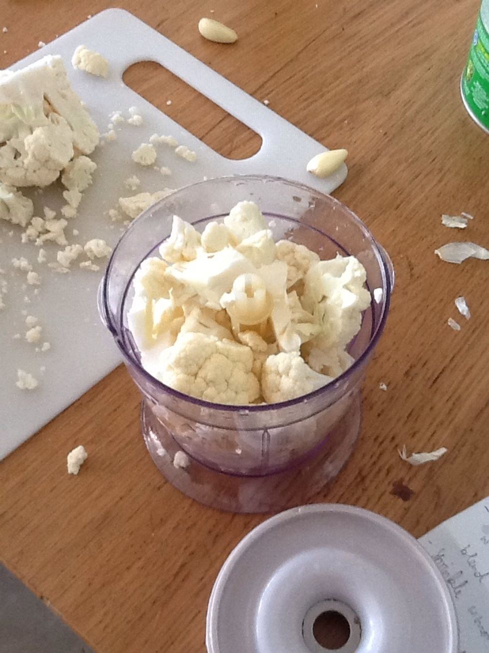 Put cauliflower into the blender and blend it.....