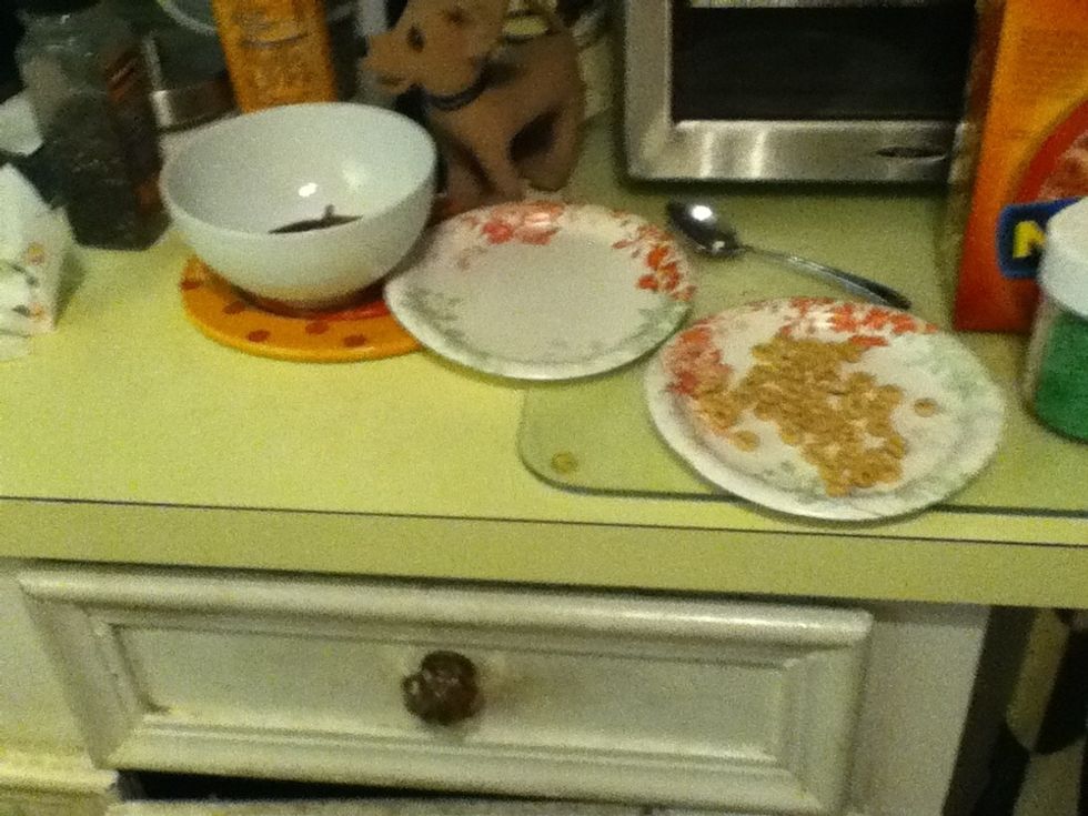 Put Cheerios on plate.