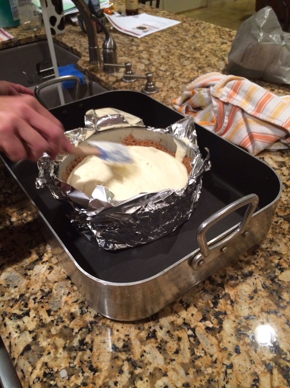 Put cheesecake filling into crust