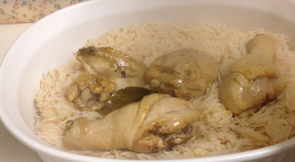 Put chicken on top of the rice