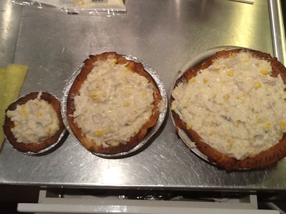 Put chicken sauce into pies them place into oven at 180 degrees for 15 minutes