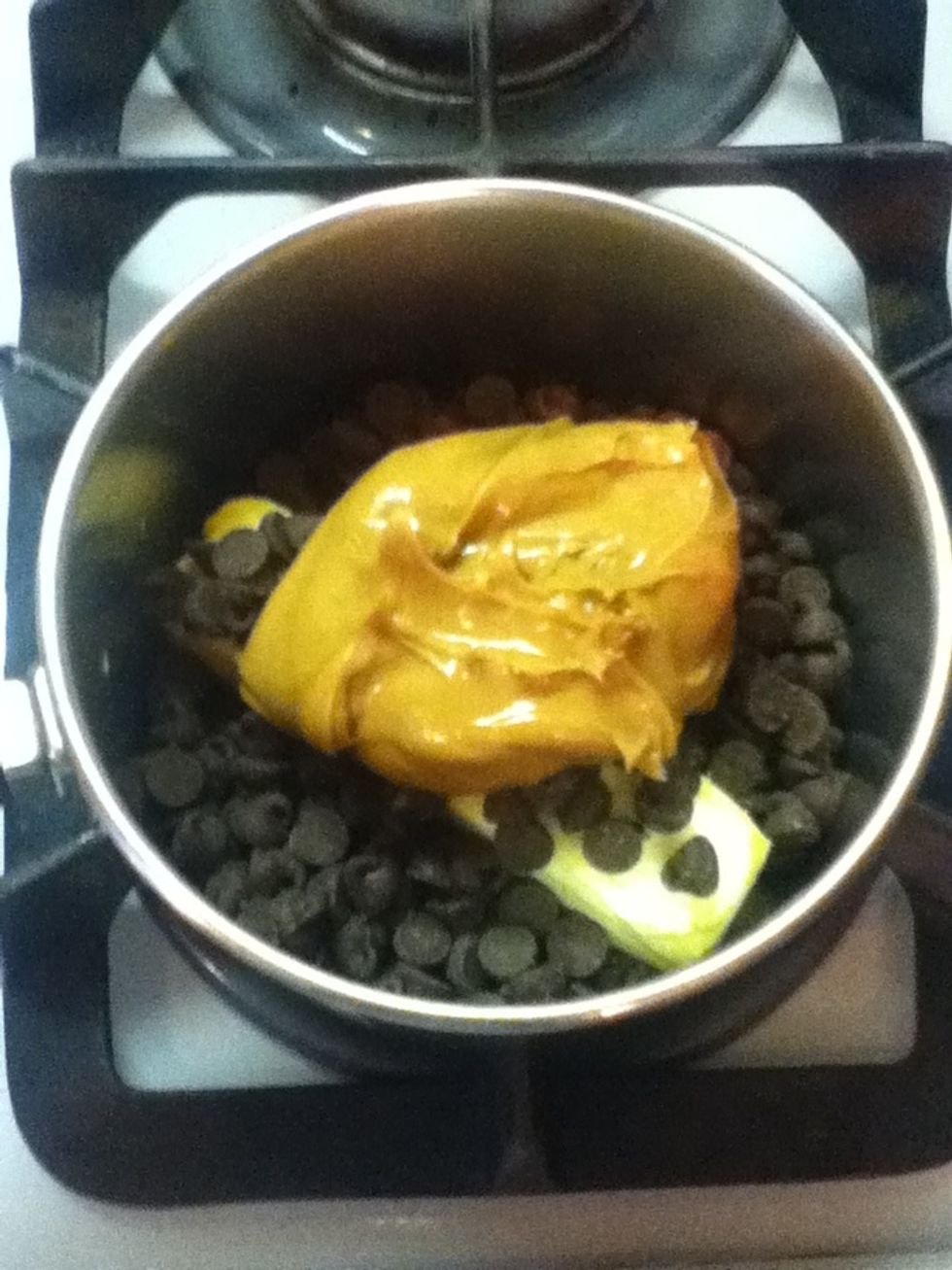 Put chocolate chips, peanut butter, and butter into a small saucepan. Turn on high and stir constantly.