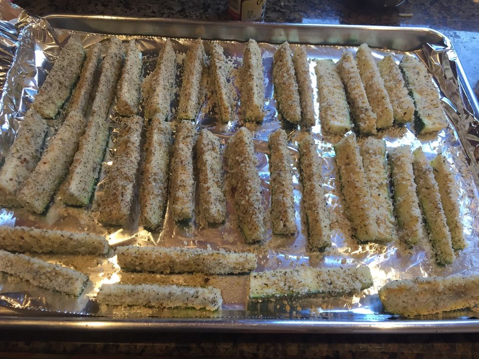 Put coated zucchini on a foil covered pan. Put in 420* oven for 15-20 minutes.