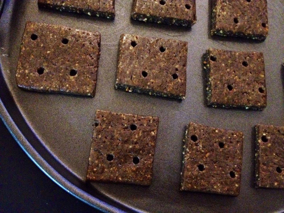 Put cookie dough back into freezer to make it rigid again. Then respace rigid cookie dough onto cookie sheet with spaces in between. Use an offset spatula to respace dough in case it sticks.