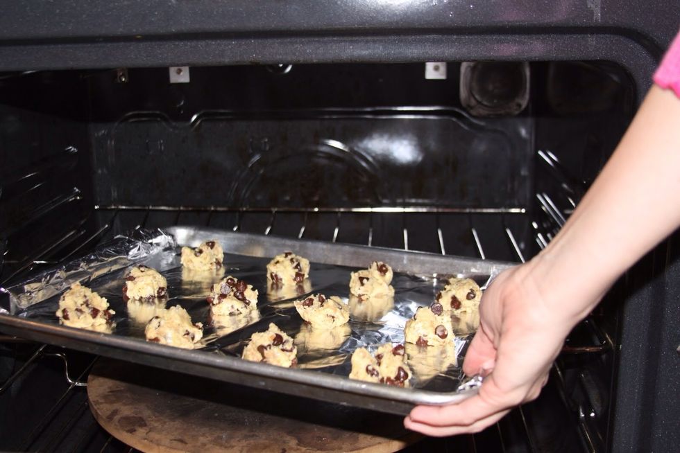 Put cookies in the oven.