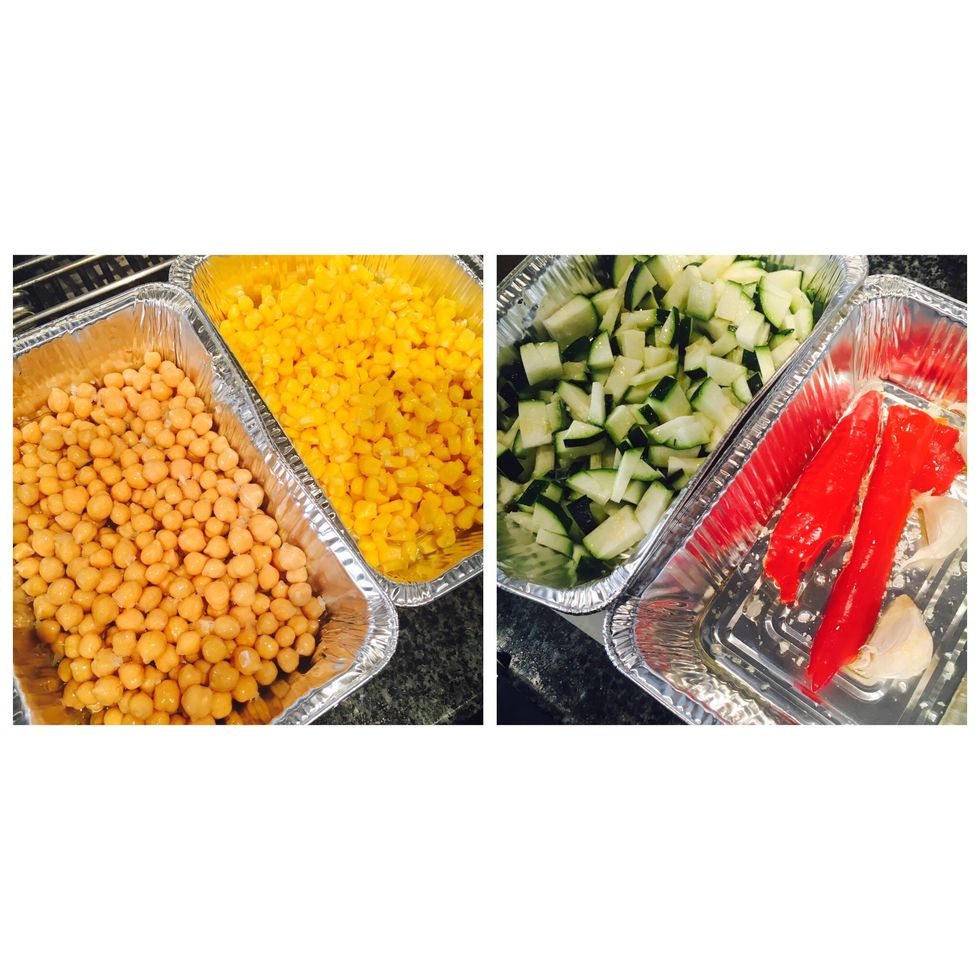Put corn, chickpeas, summer squash + chili and garlic in the grill forms (leave skin on the garlic). Drizzle with olive oil & salt.