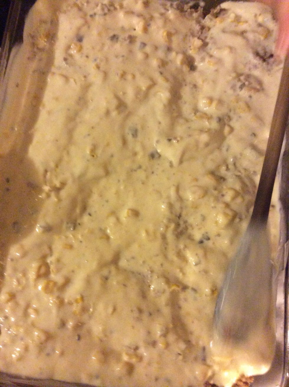 Put corn,cream of mushroom,milk,sour cream over the meat and tater tots