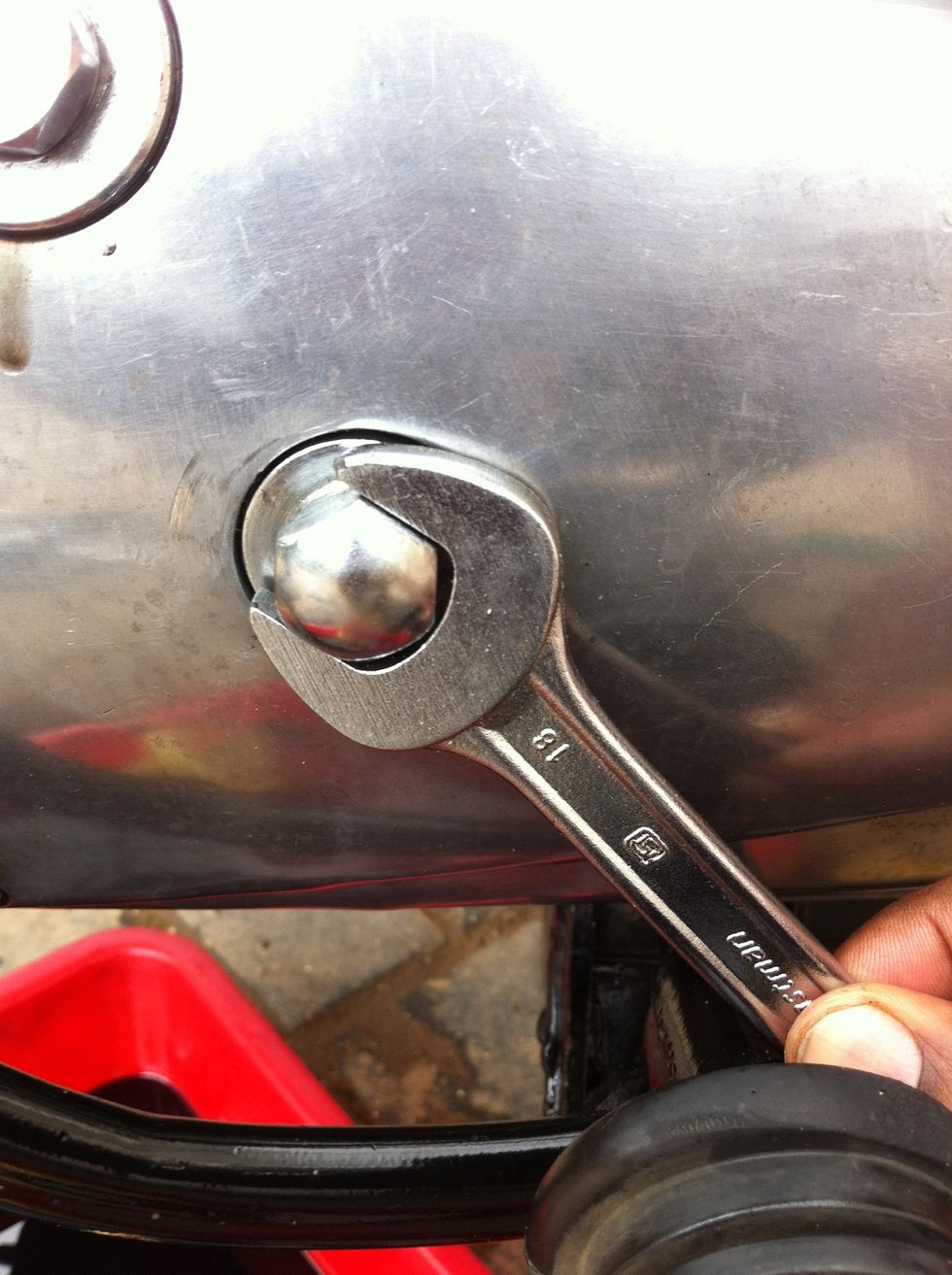 Put cover back and tighten the main nut. Inspect and decide on changing the gasket of the cover. Take care of the pin that slots thing together.