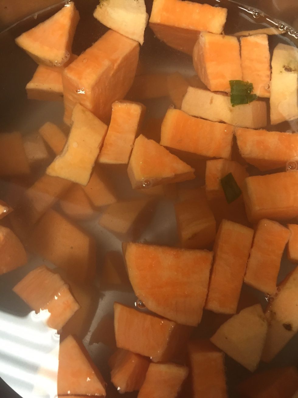 Put cubed potatoes into boiling water \ud83d\udca7