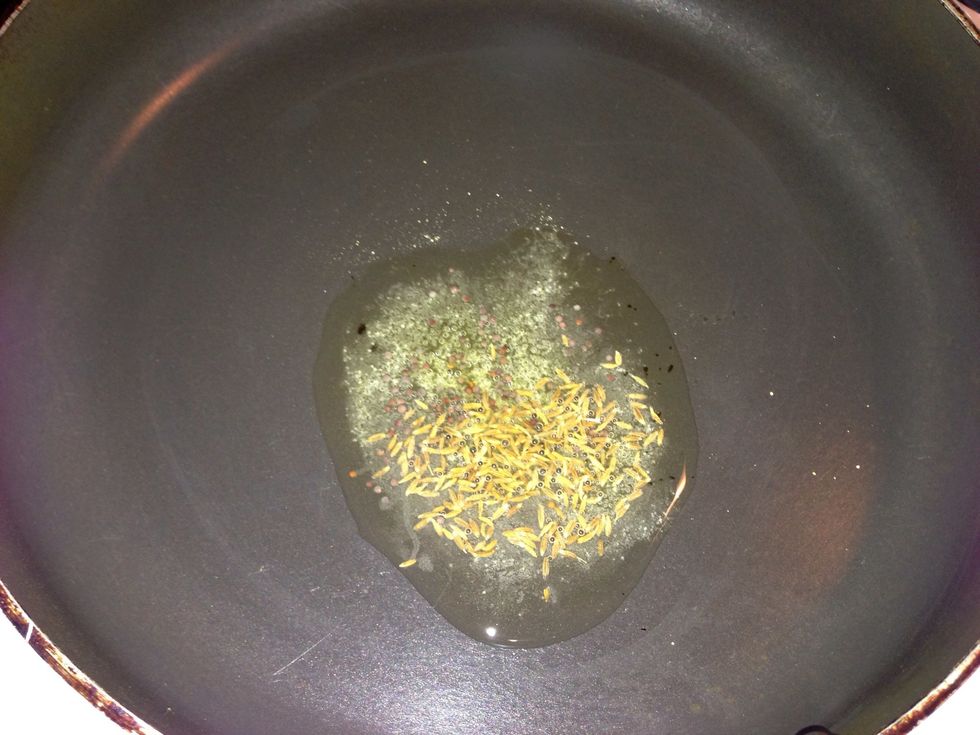 Put cumin seeds n asafetida in hot oil
