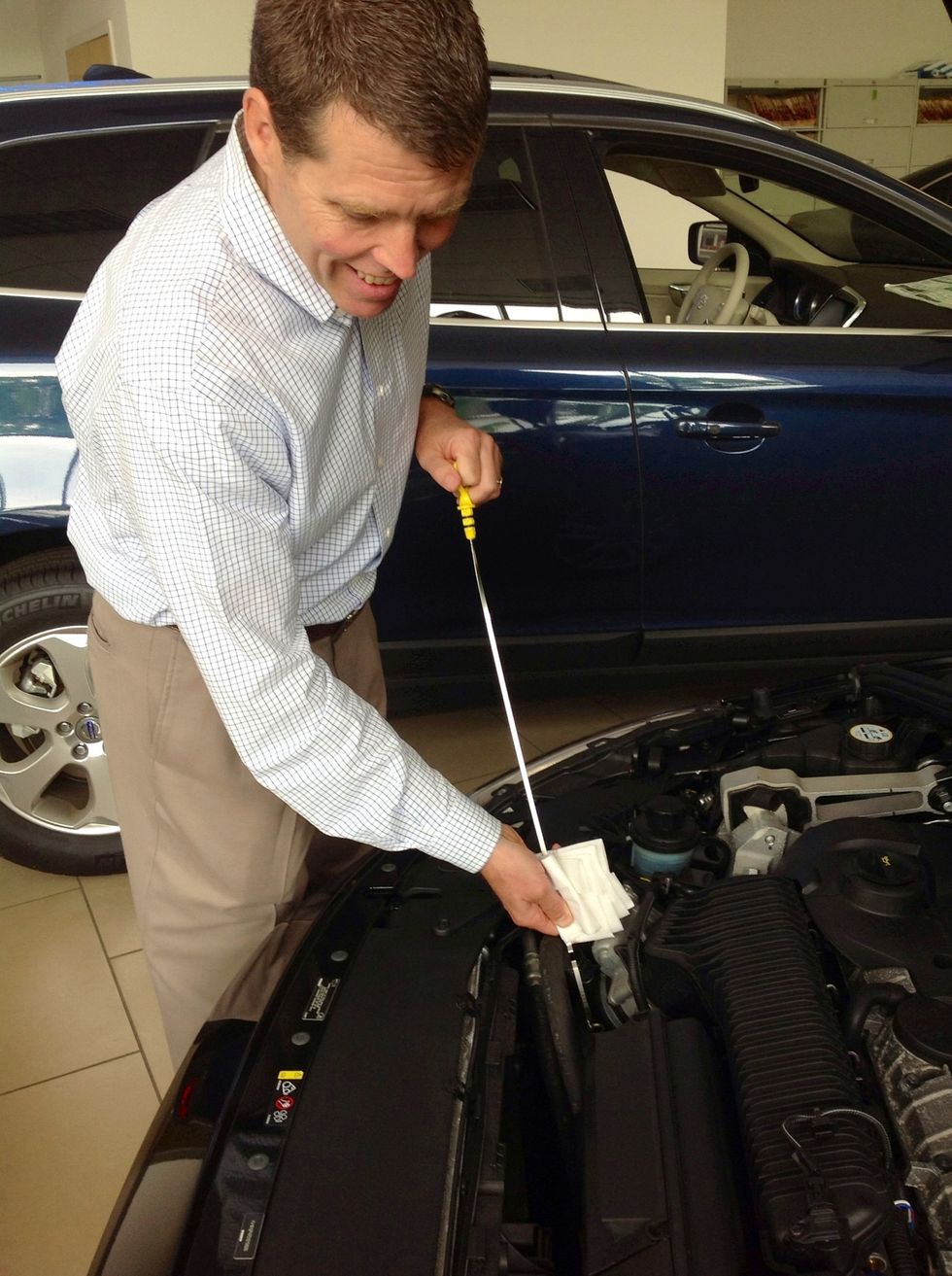 Put dipstick all the way back into car