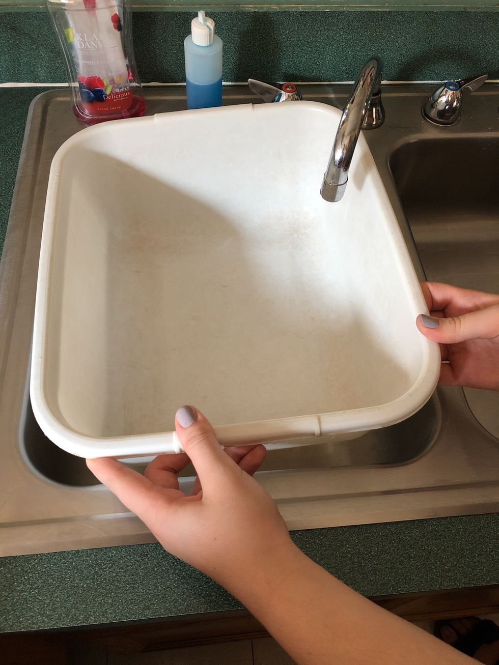 Put dish tub in the sink