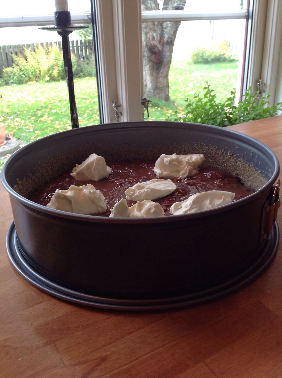 Put dollops of the cream cheese mix on top of the batter and use a spoon to make a pattern with them.