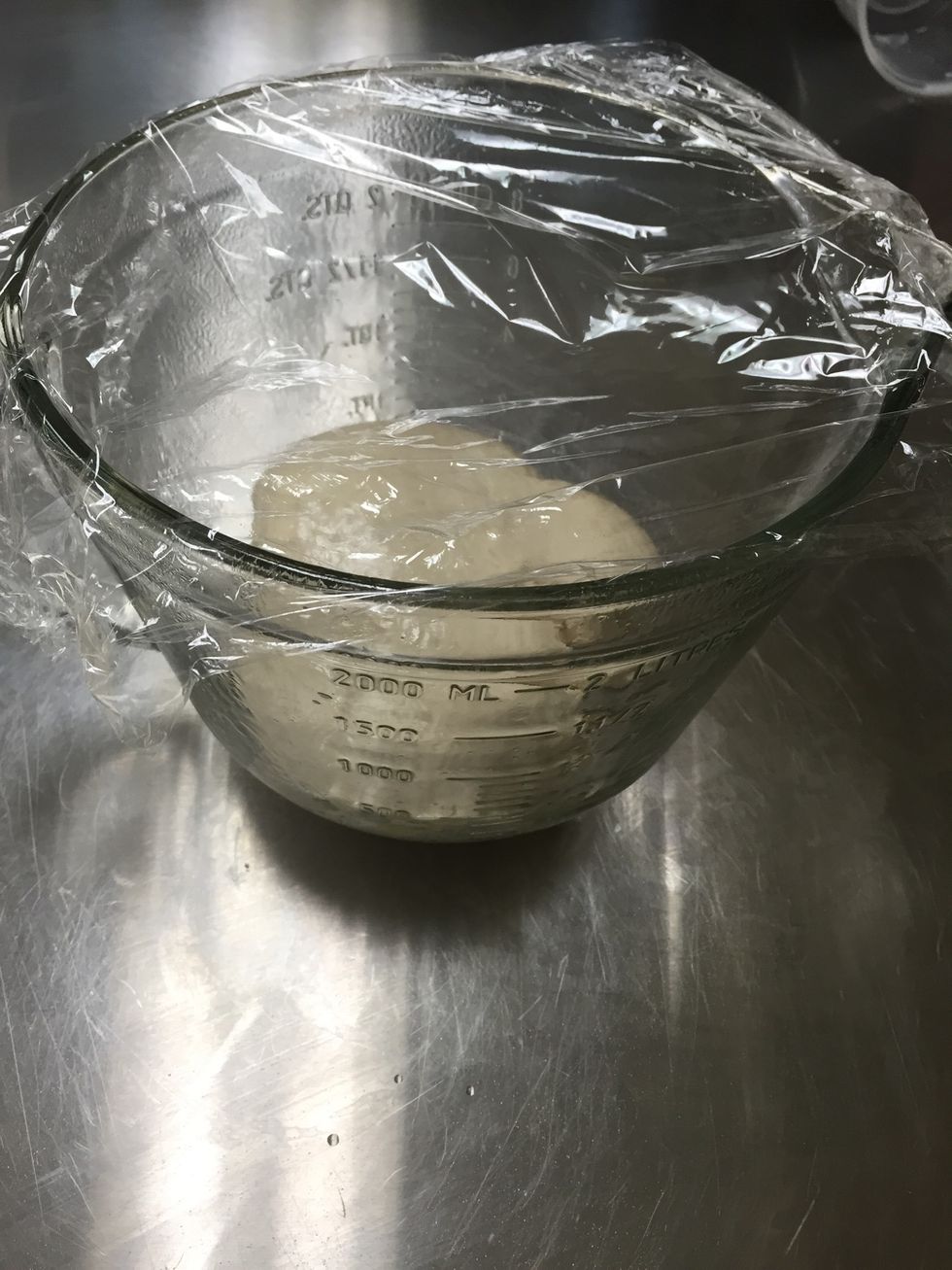 Put dough in greased bowl seal the top off, but do not make it air tight. Let dough sit for about 30 minutes until it has about doubled in size.