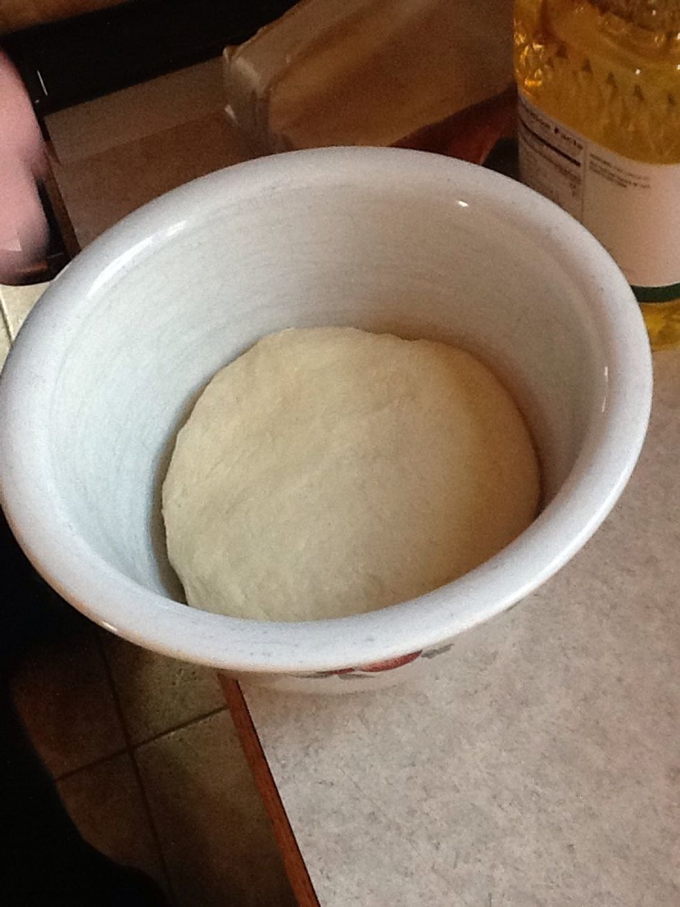 Put dough in oiled bowl.